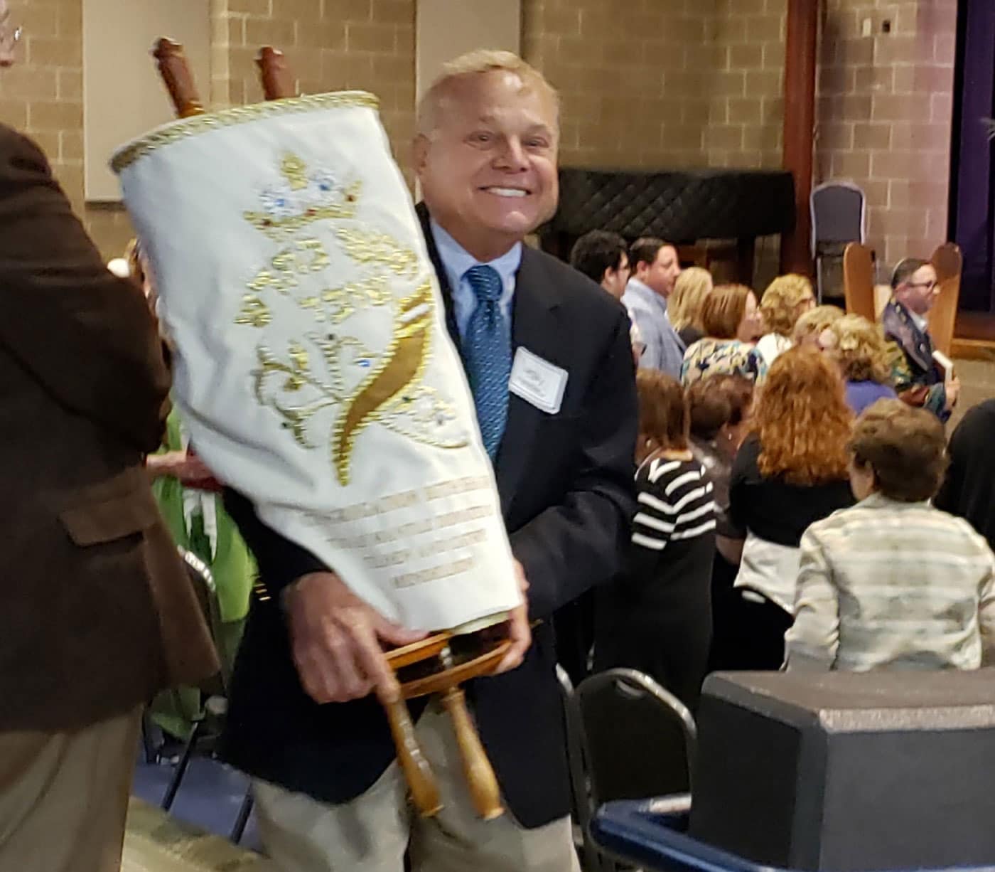 smiling man at a worship service